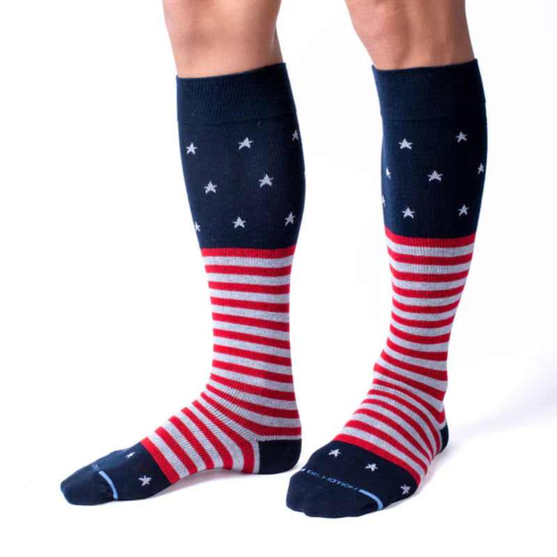 Knee-high socks with American flag design on a white background