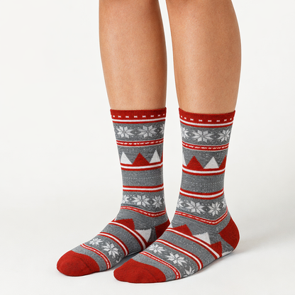 Patterned Cew socks with red, gray, and white design on a plain background