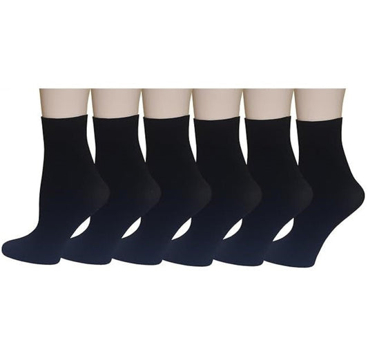Set of six black socks on a white background
