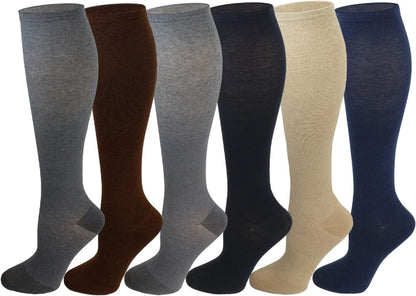 A set of six knee-high compression socks in various colors, displayed in two rows with three socks in each row. The colors include brown, gray, beige, and navy.