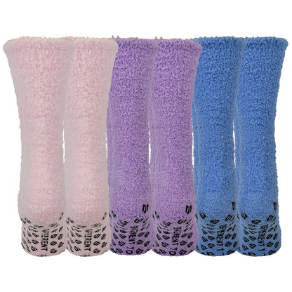 Three pairs of fuzzy socks in pink, purple, and blue on a white background.
