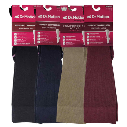 Dr. Motion Women’s knee high compression socks in assorted solid colors with mild 8–15 mmHg support