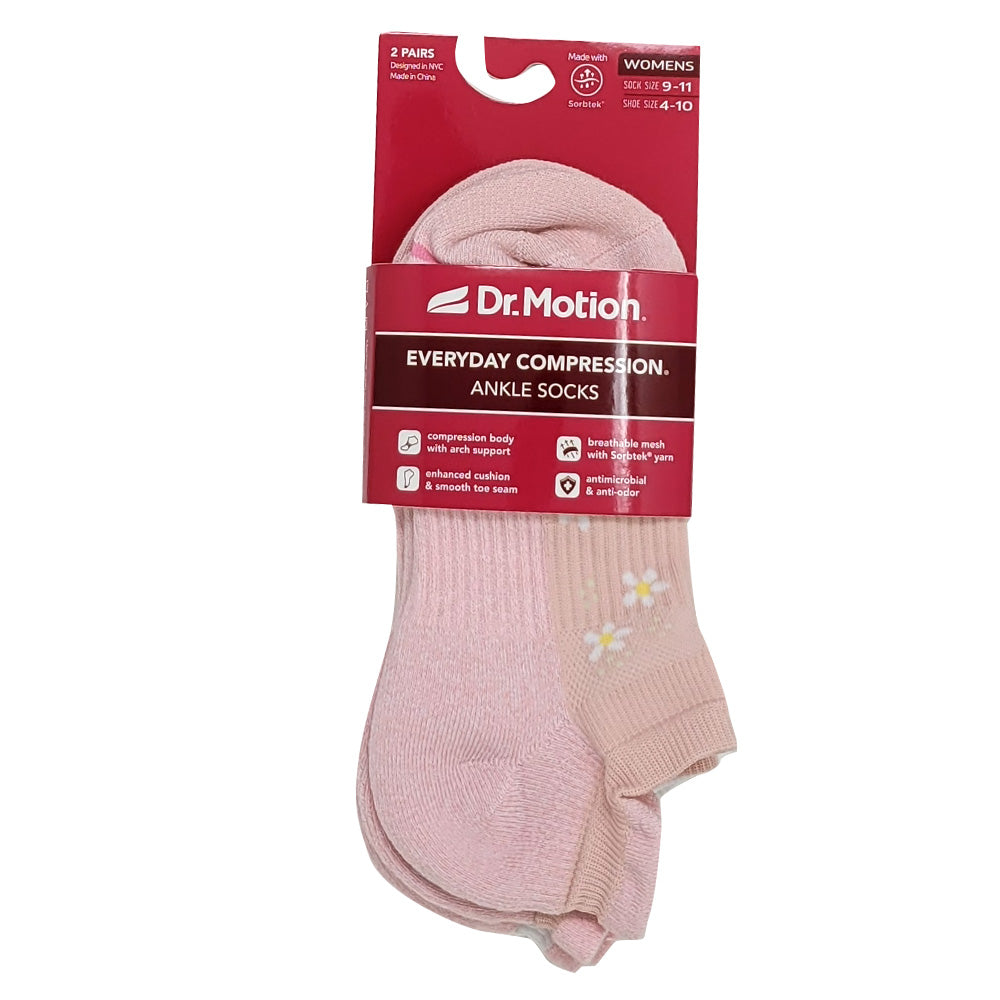 Pink ankle socks with a Dr. Motion packaging on a white background