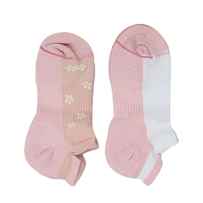 Two pairs of pink socks with floral designs on a white background
