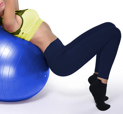 A woman wearing yoga socks